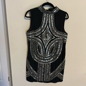 Black back zip up with silver sequins large from endless rose